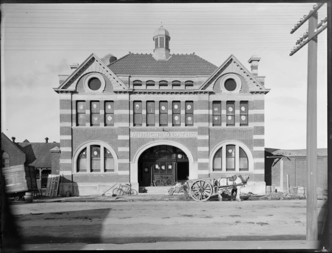 Christchurch Municipal Baths building, with a horse and cart out the front