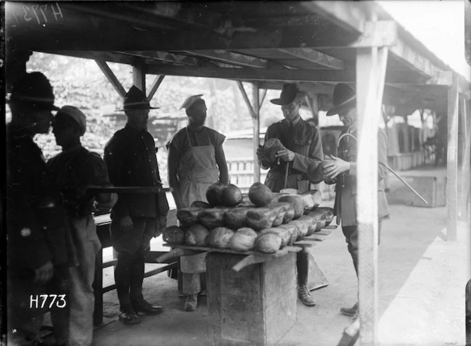 Examining a batch of bread at the New Zealand Field Bakery, Rouen