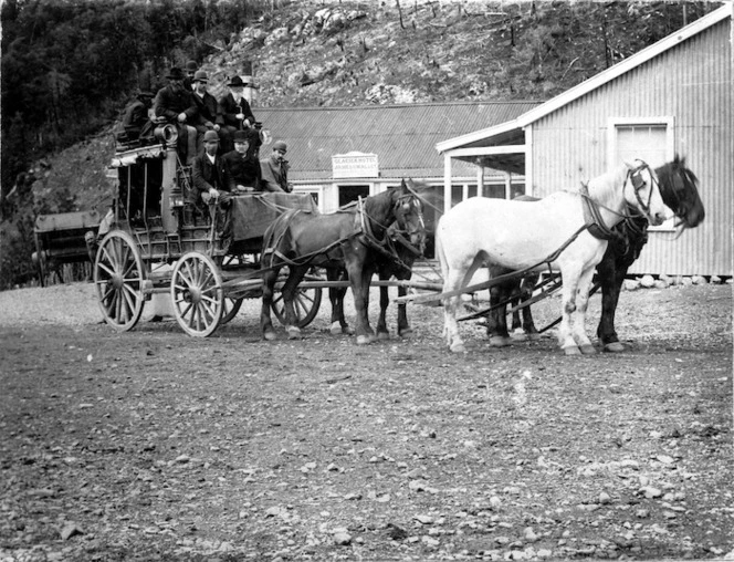 Coach and passengers, alongside the Glacier Hotel, Bealey