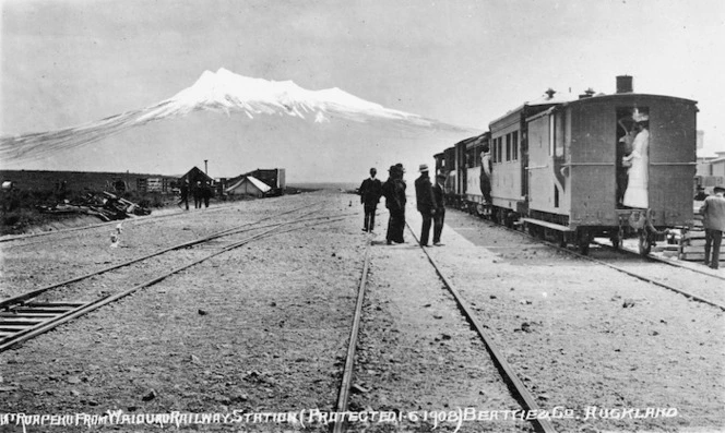 Train at Waiouru Railway Station and Mount Ruapehu - Photograph taken by William Beattie and Company