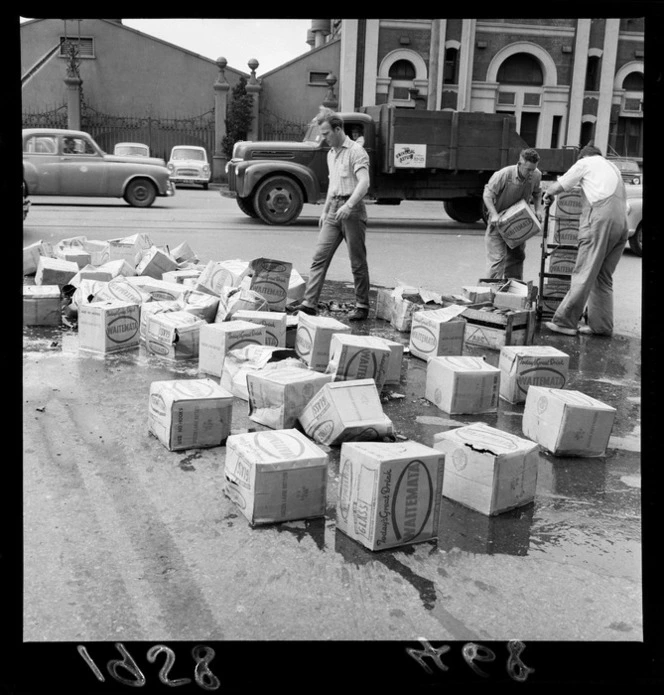 Smashed cartons of beer bottles after a traffic mishap