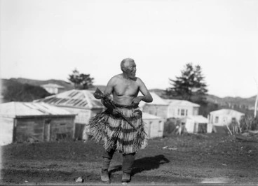 Image: Maori man with tewhatewha at Parihaka