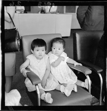 Image: Two Chinese orphans from Hong Kong at Wellington Airport