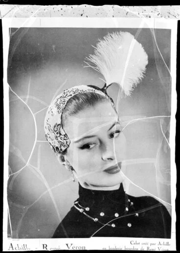 Image: Model wearing feather headpiece