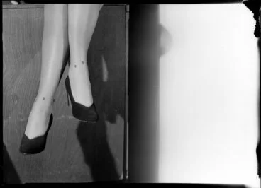Image: Feet modelling high heeled shoes & jewelled stockings