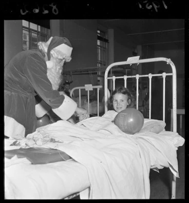 Image: Children in hospital being visited by Santa Claus