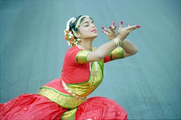 Image: Narmadai Chinniah performing an Indian classical dance - Photograph taken by Melanie Burford