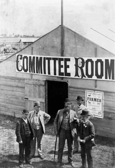 Image: Men outside a committee room at an Agricultural and Pastoral show