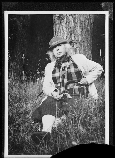 Image: Frances Mary Hodgkins sitting underneath a tree