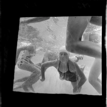 Image: Children swimming as seen through the underground window of the Naenae Olympic Pool, Lower Hutt