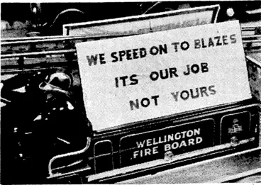 Image: Evening Post" Photo. Pertinent advice to motorists was a feature of yesterday's "Road Safety Week" procession through the city. The above sign was carried on one of'the fire engines. (Evening Post, 06 December 1938)