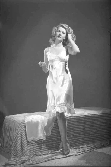 Image: Full length portrait of Miss Sheila McGuire, modelling for Silknit