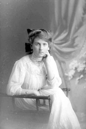 Image: Miss E Morpeth seated with left elbow leaning knee and resting....