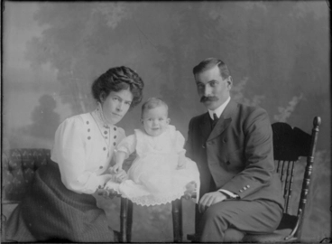 Image: 3/4 length portrait of the Parris family group, the man seated....