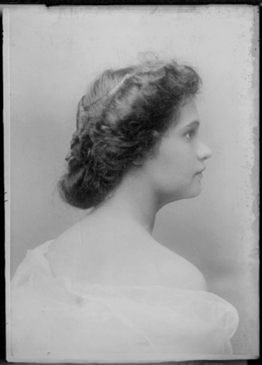 Image: 1/4 length profile portrait of a unidentified woman with bare....