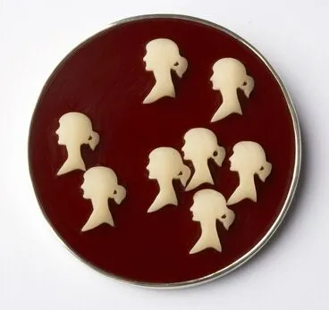 Image: Eight O. Cooks motif brooch