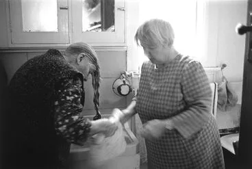 Image: Hidden Lives: the work of care. Audrey helping to wash her mother's hair