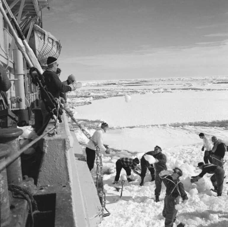 Image: Throwing blocks of snow on board HMNZS 'Endeavour' to replenish the water supply