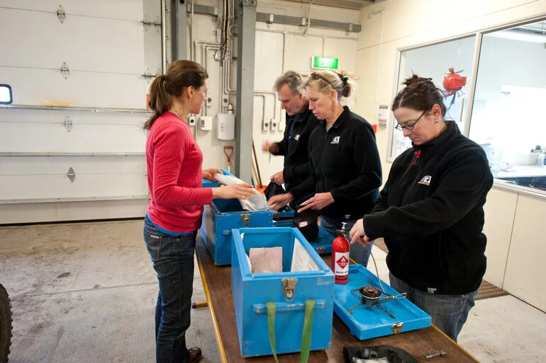 Image: Learning how to light a survival pack stove