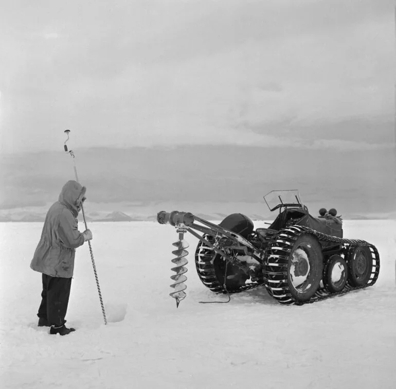 Image: Miller testing depth of the sea ice