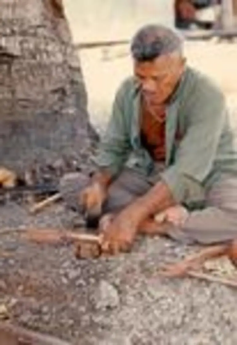 Image: Elders and men making craft objects