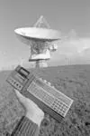 Image: Handheld computer and satellite station