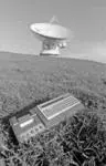 Image: Handheld computer and satellite station