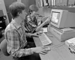 Image: Two students in a computer science lab