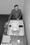 Image: Dr. Richardson from the Department of Classics and Ancient History using a Mackintosh Plus 1Mb computer
