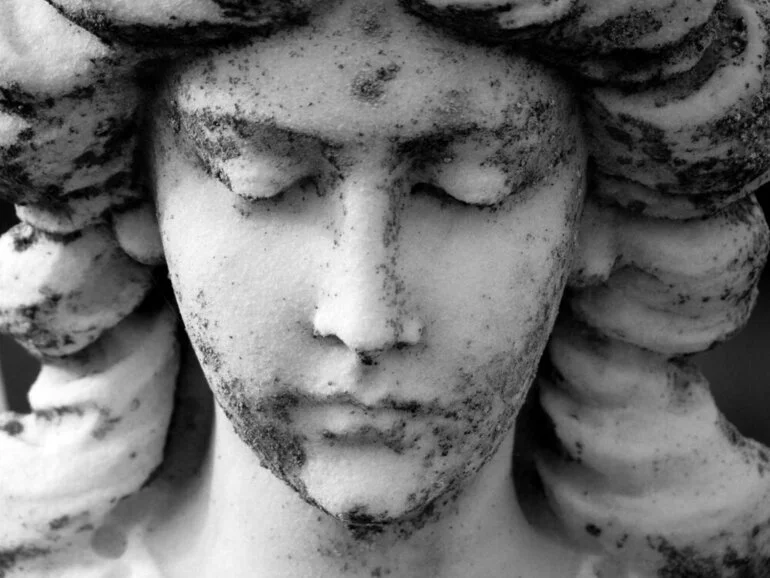 Image: Sadness in the angel's face.