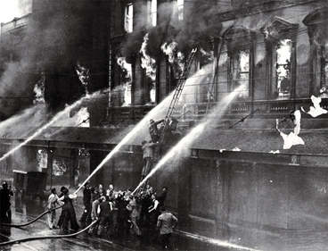 Image: Rescuing Mr K. Ballantyne from the burning building on Colombo Street, Christchurch