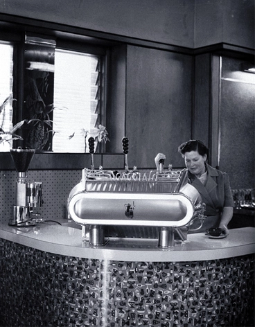 Image: Woman serving expresso coffee at Fails Cafe, 82 Cashel Street, near the Bridge of Remembrance