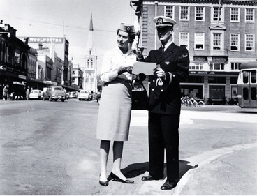 Image: Male and female cabin crew of TEAL standing at the corner of Colombo and Armagh Streets