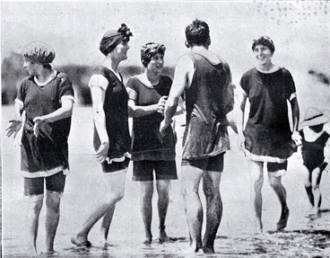 Image: A group of young bathers in bathing costumes in the surf at Sumner beach on the Anniversary Day of Christchurch