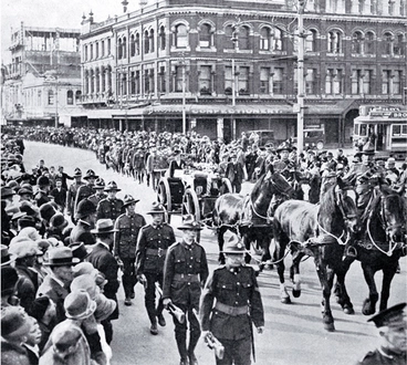 Image: The gun carriage and firing party follow the wreath bearers, Christchurch