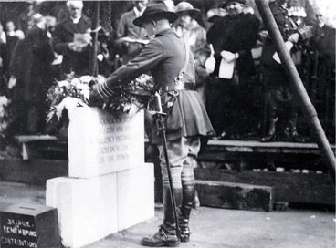 Image: Colonel Hugh Stewart, President of the Christchurch Branch of the RSA places a wreath on the foundation stone, Bridge of Remembrance