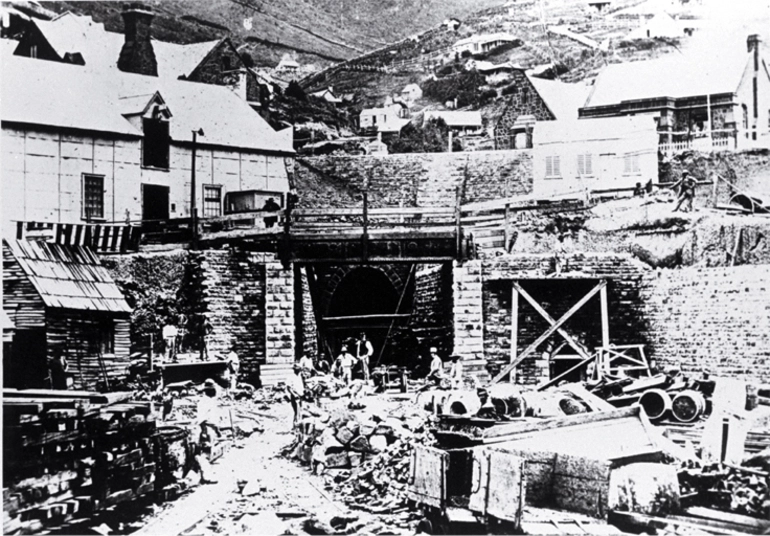 Image: The Lyttelton portal of the Lyttelton Rail Tunnel with construction workers