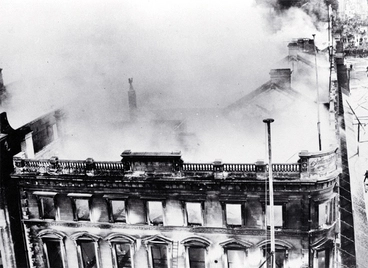 View of still smoking Ballantyne's building from the corner of Cashel and Colombo Streets, Christchurch Image: View of still smoking Ballantyne's building from the corner of Cashel and Colombo Streets, Christchurch
