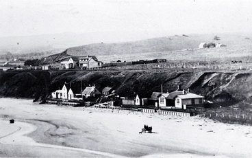 Image: Waitangi showing Odman's and Heslop's hotels at the left : to the right is the combined post office and courthouse.