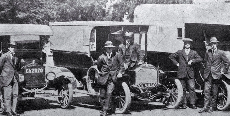 Image: A section of a long photograph of vehicles used by the St John Ambulance Brigade as ambulances during the 1918 influenza epidemic