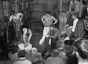 Image: 1954 Diploma students receive instruction in shearing from Mr Godfrey Bowen