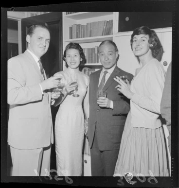 Image: Unidentified guests at the home of Mr and Mrs R B Edmonds, during a cocktail party for diplomats, [Wellington?]