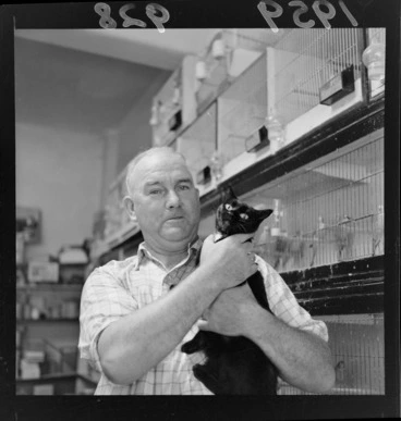 Image: Mr R E Dore with a cat