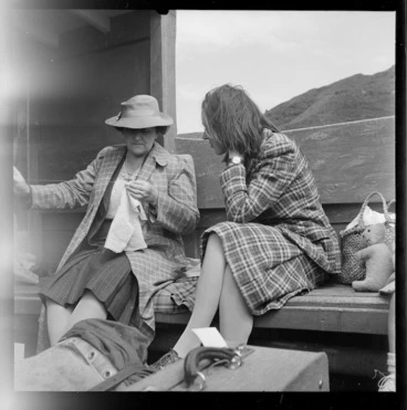 Image: Scene on a mail launch in the Marlborough Sounds showing Dorothy Pascoe talking to a woman who is hand sewing