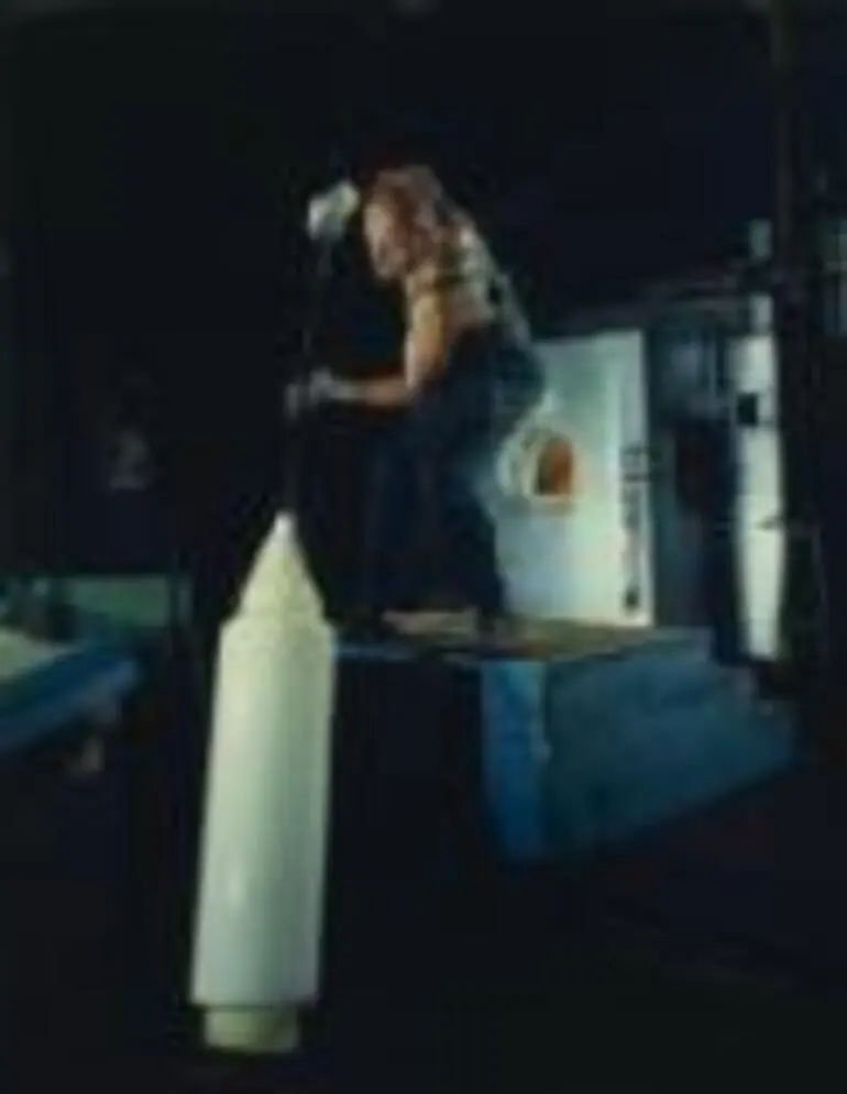 Image: Unidentified glass blower at A.C.I. Crown Glass, Christchurch, New Zealand, 1964 [transparency] /