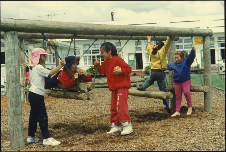 Image: Children on playground equipment