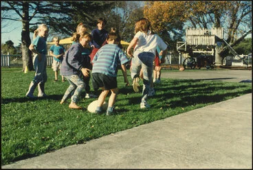 Image: Children playing with rugby ball