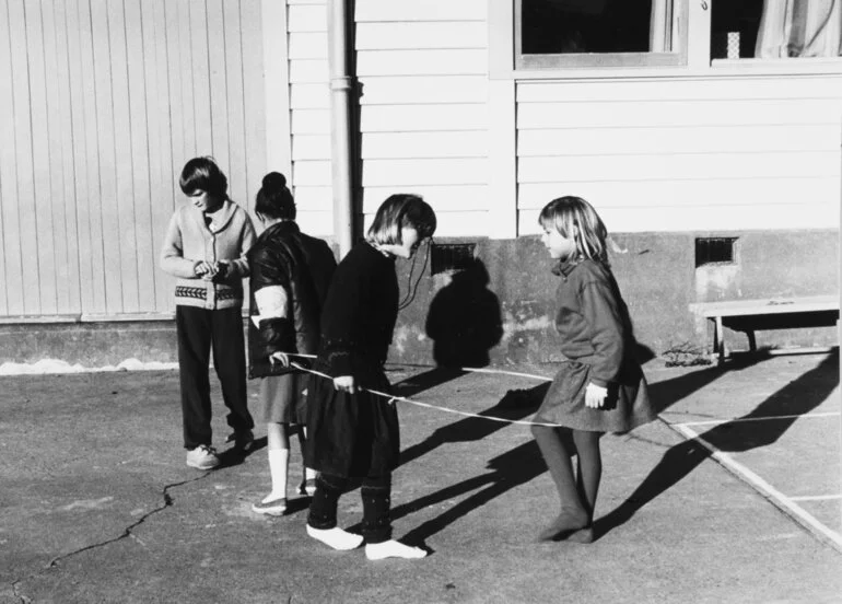 Image: Children playing 'elastics'