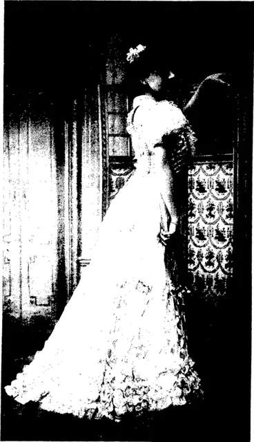 Image: Felix, photo, Paris. BALL DRESS FOR A DEBUTANTE.  Ball dress of fancy tvTle, azure, trimmed wi*h narrow ribbon lattice work in same shade  (Zanmermann). (Otago Witness, 22 May 1907)