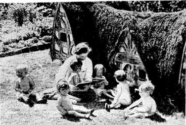 Image: Llllle sunbathers outside a model house at the Duchess of York's Hospital for Babies at Burnage, Manchester. The nurse is jeading a fairy tale to her charges. (Evening Post, 13 January 1940)